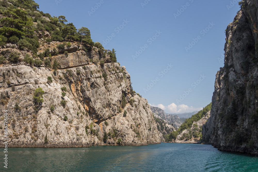 Green Canyon in Turkey, the city of Manavgat. Taurus Mountains and an artificial lake-reservoir. Excursions to Green Canyon Green Canyon in Turkey, the city of Manavgat. Taurus Mountains and an artificial lake-reservoir. Excursions to Green Canyon