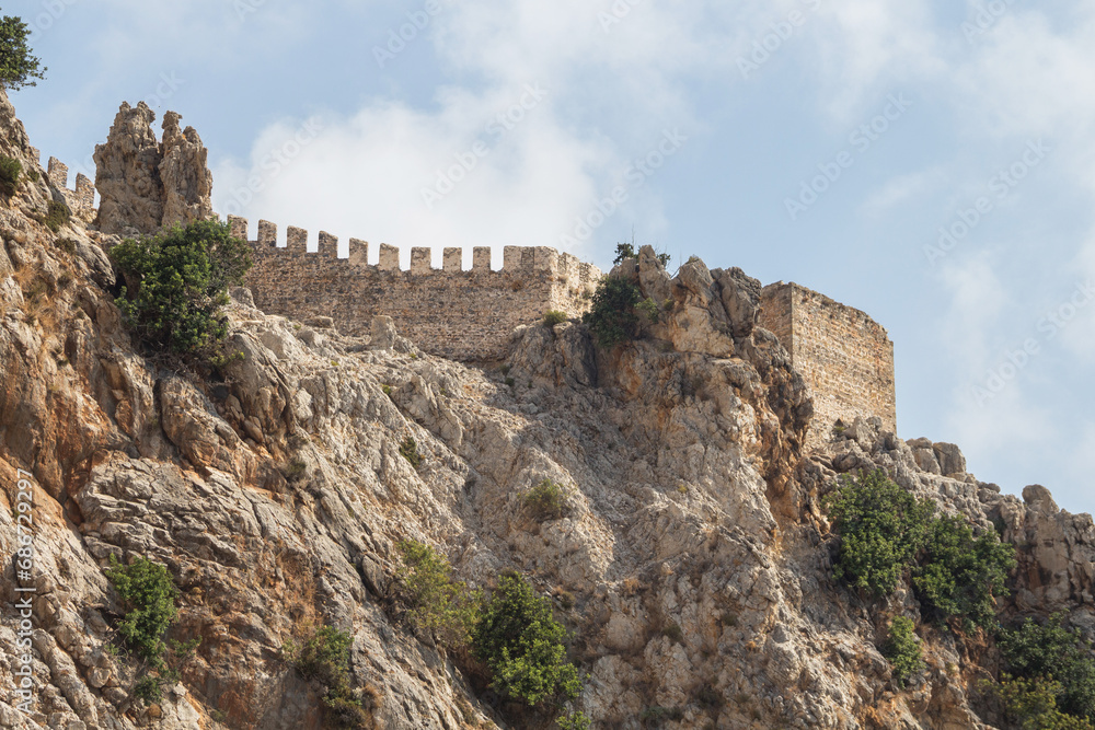 Medieval fortress in the city of Alanya in southern Turkey. Fortress on a rocky peninsula in the Mediterranean Sea.