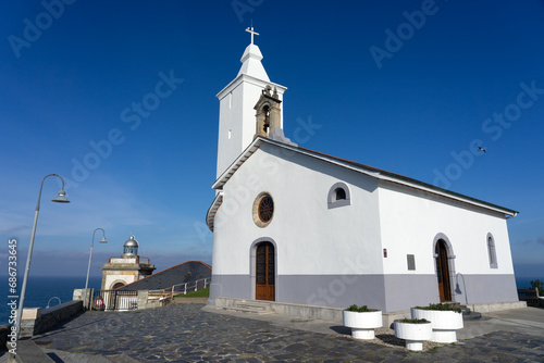 Nueatra Señora la Blanca chapel in Luarca in a sunny day, Asturias, Spain.