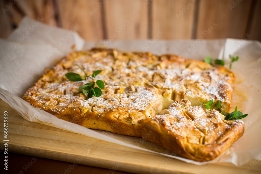 prepared curd semolina pie with quince inside and covered with powdered sugar . prepared curd semolina pie with quince inside and covered with powdered sugar .