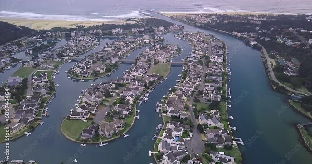 Travel, nature and drone of harbor town with lake, grass and