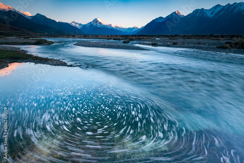 Slow shutter speed captures the motion of the Tasman River coming off the Tasman Glacier; South Island, New Zealand