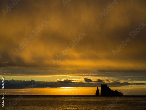 Leon Dormido or Kicker Rock at sunset from San Cristobal Island; Cristobal Island, Galapagos Islands, Ecuador photo