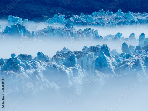 Rugged ice formations on the icebergs at the Ilulissat Icefjord; Ilulissat, Greenland photo