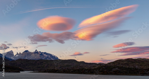 Sunrise from Lago Grey with lenticular clouds in Torres del Paine National Park; Patagonia, Chile photo