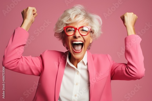 happy elderly woman rejoices at a successful project