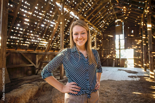 Portrait of a teenage girl in an old barn; Dunbar, Nebraska, United States of America
