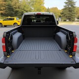 Pickup car with open trunk door ready for loading. Empty trunk boot on pick up car ready for trip. Back view