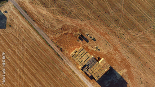 overhead view of a mountain of straw bales photo