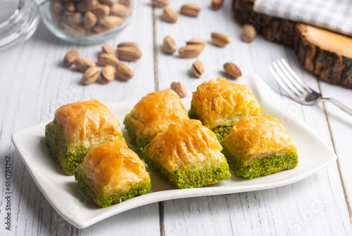 Traditional delicious Turkish dessert; pistachio baklava (Turkish name; kuru baklava) photo