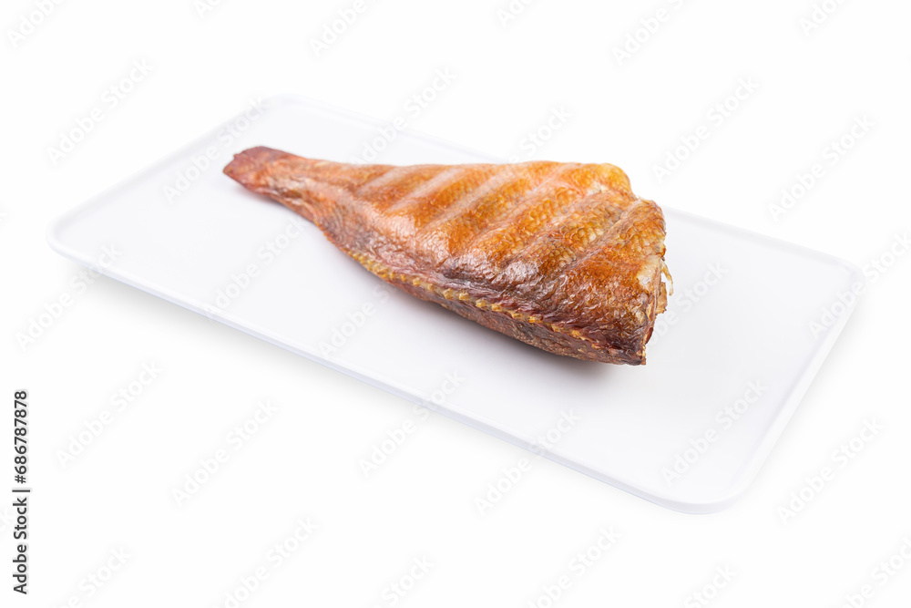 Smoked fish on a white plate from a fish shop
Smoked fish on a white plate from a fish shop