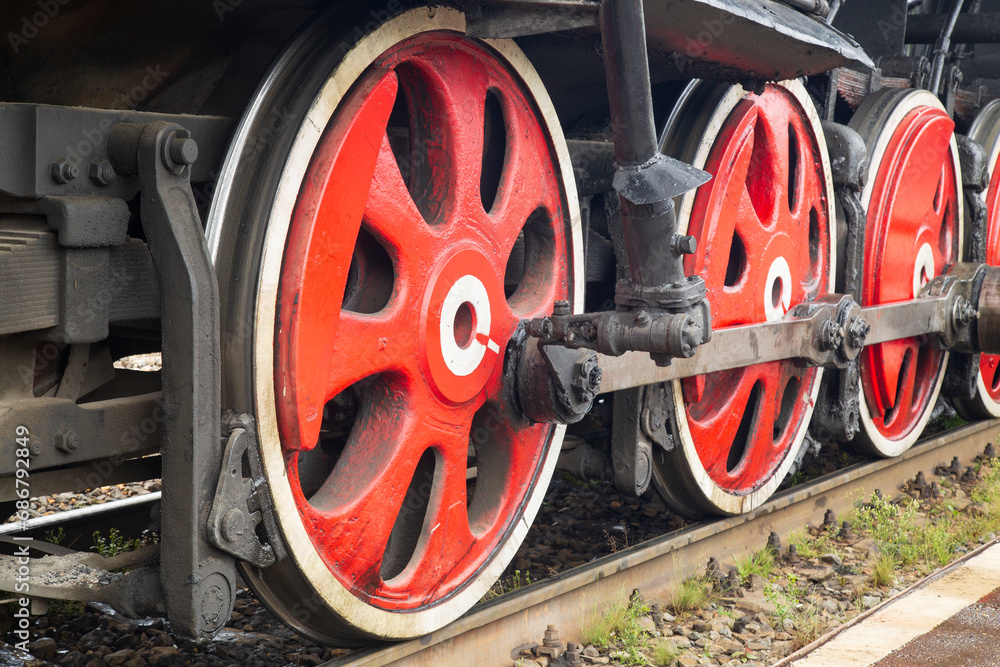 An old steam locomotive of the early 20th century on the railway track. An old steam locomotive of the early 20th century on the railway track.