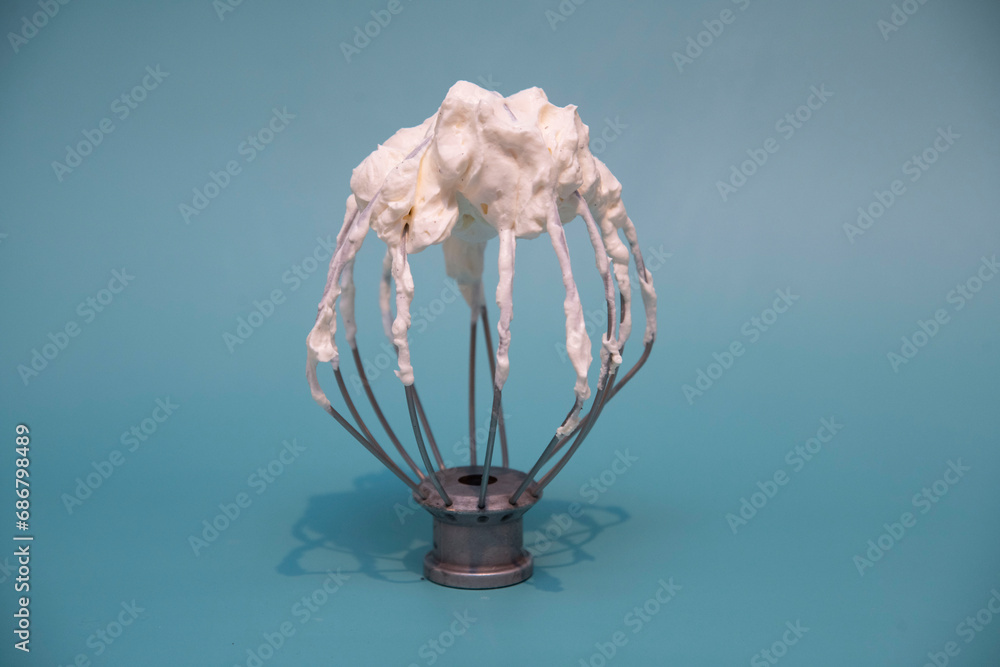 balloon whisk with cream