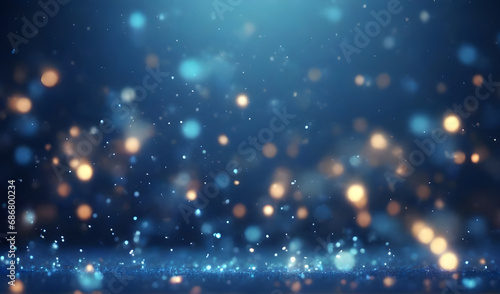 Abstract sparkling blue and gold particles with bokeh defocused lights background
