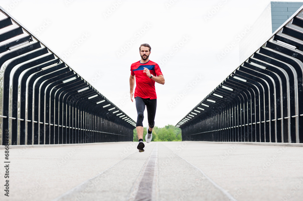Man running on a bridge