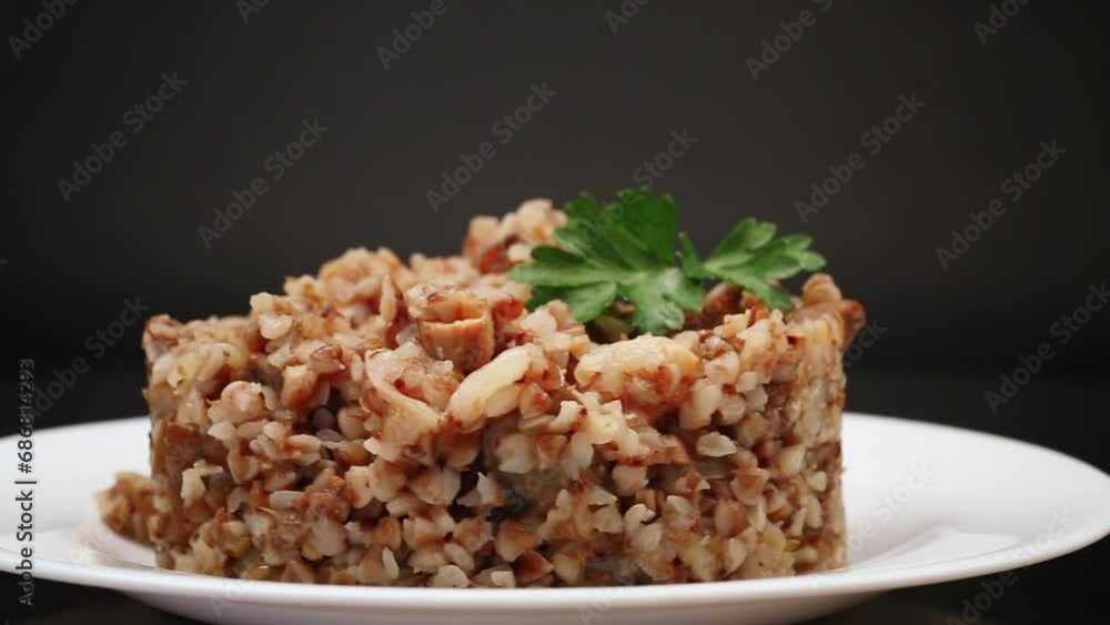 cooked buckwheat boiled with mushroom filling in a plate cooked buckwheat boiled with mushroom filling in a plate