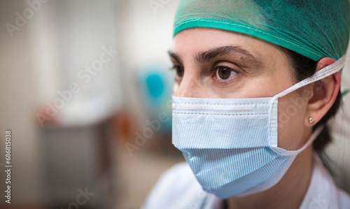 Portait of doctor wearing a mask photo