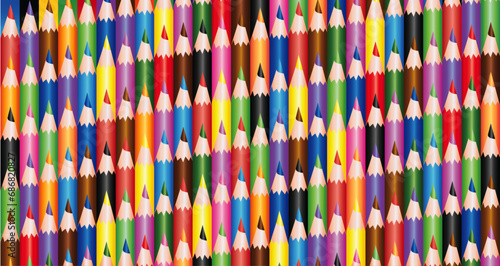 Horizontal format background texture with lot of colorful school crayons diagonally aligned