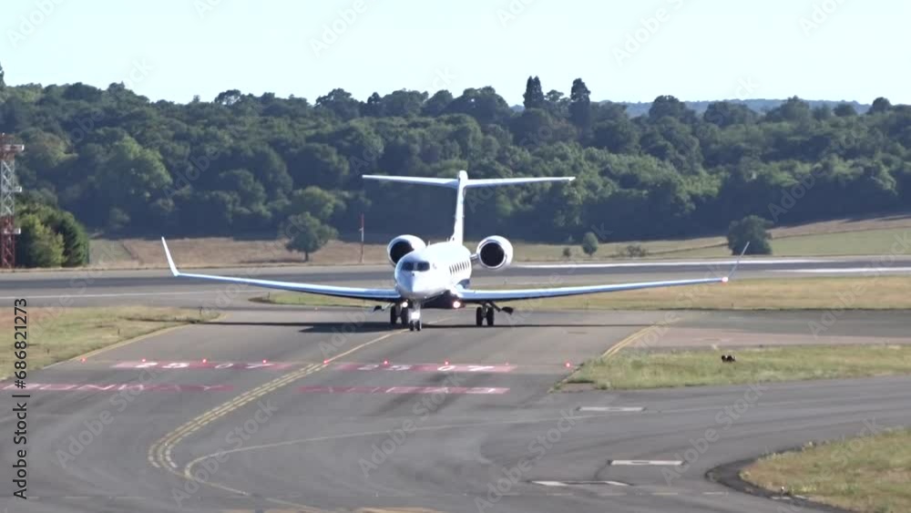 Business Jet corporate jet executive jet private jet Taxiing after Landing at Airport Business Jet corporate jet executive jet private jet Taxiing after Landing at Airport