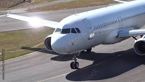 White Generic Unmarked Aircraft Airplane jet passenger Close Up Taxiing at Airport departing departure