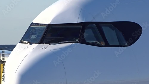 Generic Airplane Cockpit Window Static Shot White and Black International Airport photo