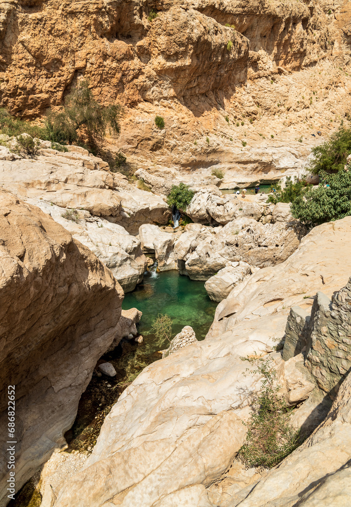 View of the Wadi Bani Khalid oasis in the desert in Sultanate of Oman.