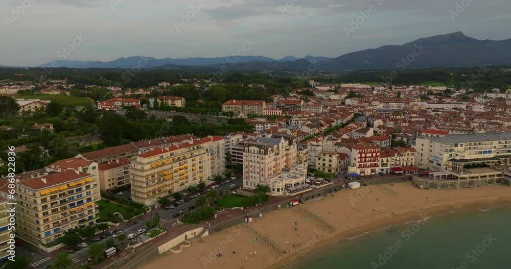 Saint-Jean-de-Luz famous resort fishing port on the Basque coast natural sandy bay France. Drone view of Ciboure beach next to the canal Saint-Jean-de-Luz famous resort fishing port on the Basque coast natural sandy bay France. Drone view of Ciboure beach next to the canal