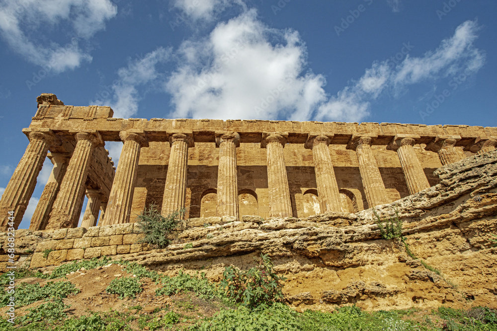 Ancient Greek Temple of Concord in the Valley of the Temples in Agrigento, on the southern coast of Sicily, Italy. Ancient Greek Temple of Concord in the Valley of the Temples in Agrigento, on the southern coast of Sicily, Italy.
