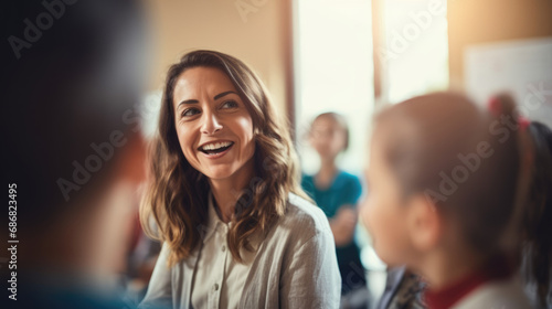 Female Teacher Interacting with Young Students in Classroom