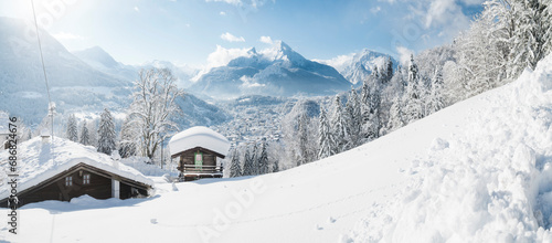 Germany, Bavaria, Berchtesgaden, Mountain hut and Watzmann in deep snow photo