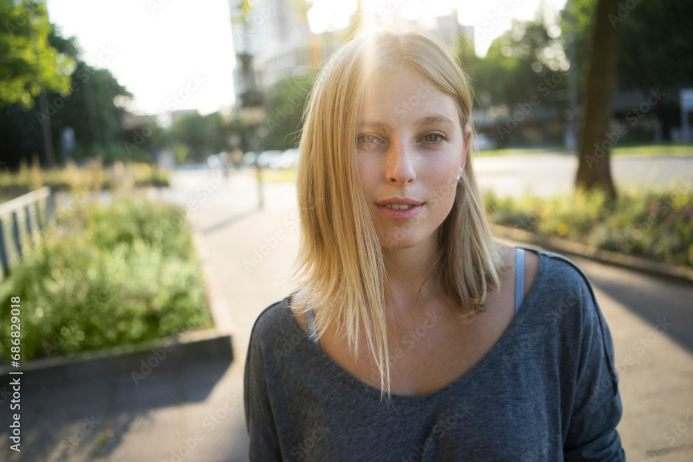 Portrait of blond young woman at backlight Portrait of blond young woman at backlight