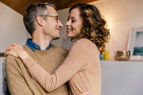 Happy affectionate couple at home photo