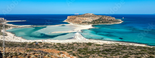 Blue lagoon in Balos, Crete, Greece. Beautiful lagoon at Mediterranean Sea. Balos Bay capture on the top of the mountain. View from above on a Gramvousa Island. Banner. photo