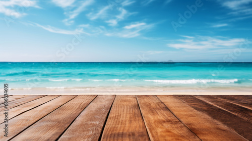 Empty wooden table or pier with sunny beach and sea on background. With copy space for your product.