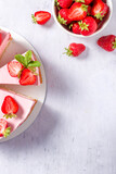 Strawberry cake. Menu concept. Homemade strawberry cake decorated with strawberries and mint leaves. Flat lay. Copy space