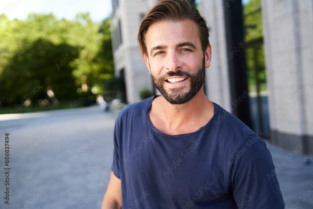 Portrait of smiling man in the city Portrait of smiling man in the city