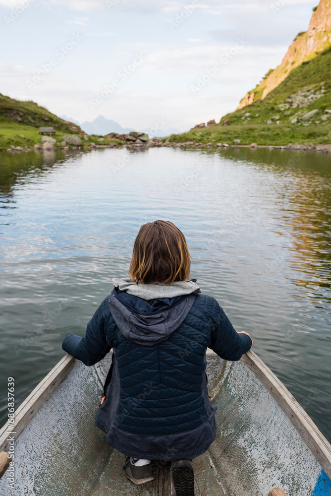 Austria, Tyrol, Fieberbrunn, Wildseeloder, woman in a boat on lake Wildsee Austria, Tyrol, Fieberbrunn, Wildseeloder, woman in a boat on lake Wildsee
