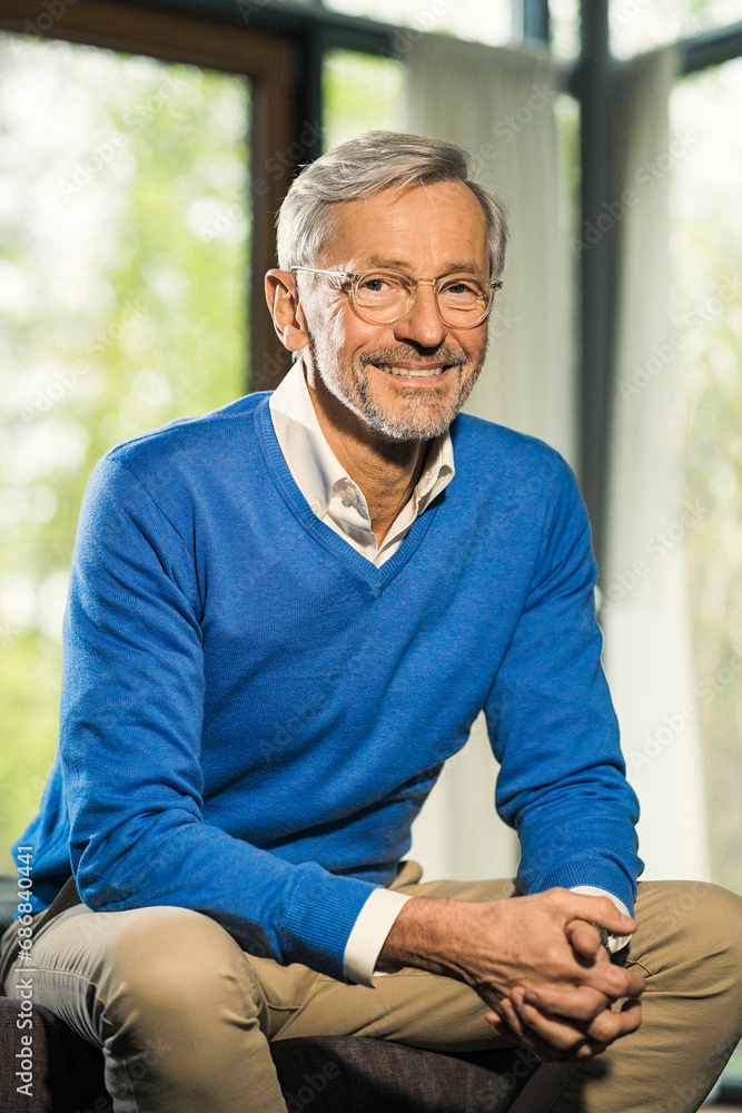 Portrait of smiling senior man at home Portrait of smiling senior man at home