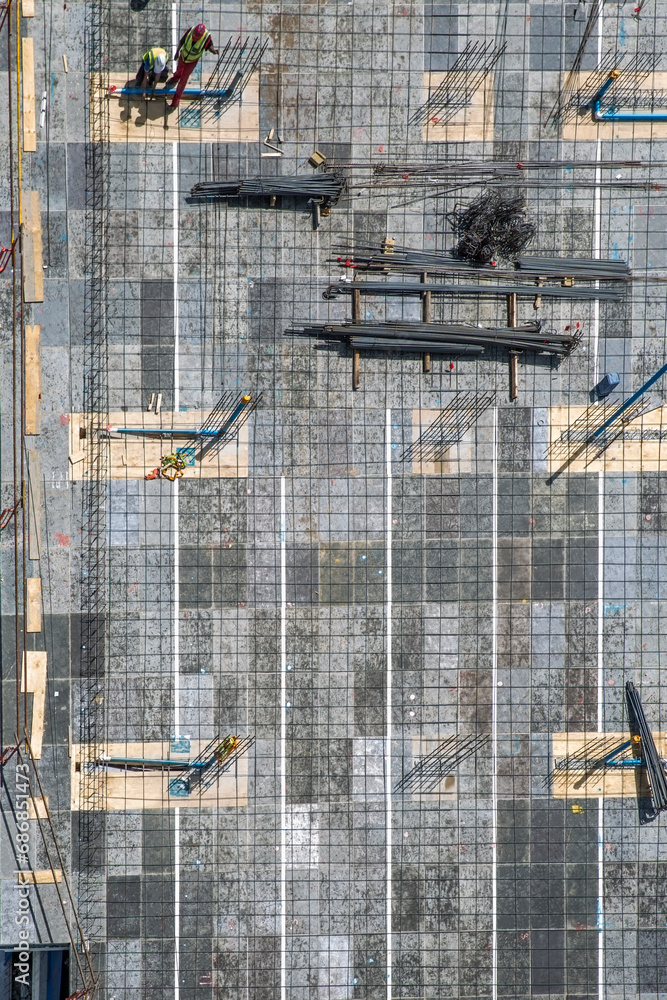 Two workers on construction site, top view Two workers on construction site, top view