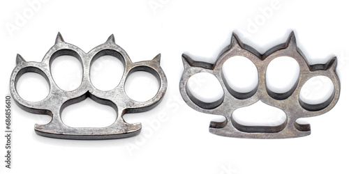 Cuadro en lienzo Old metal brass knuckles knuckledusters with spikes isolated on white background injuries, street fights, fights without rules, urban crime