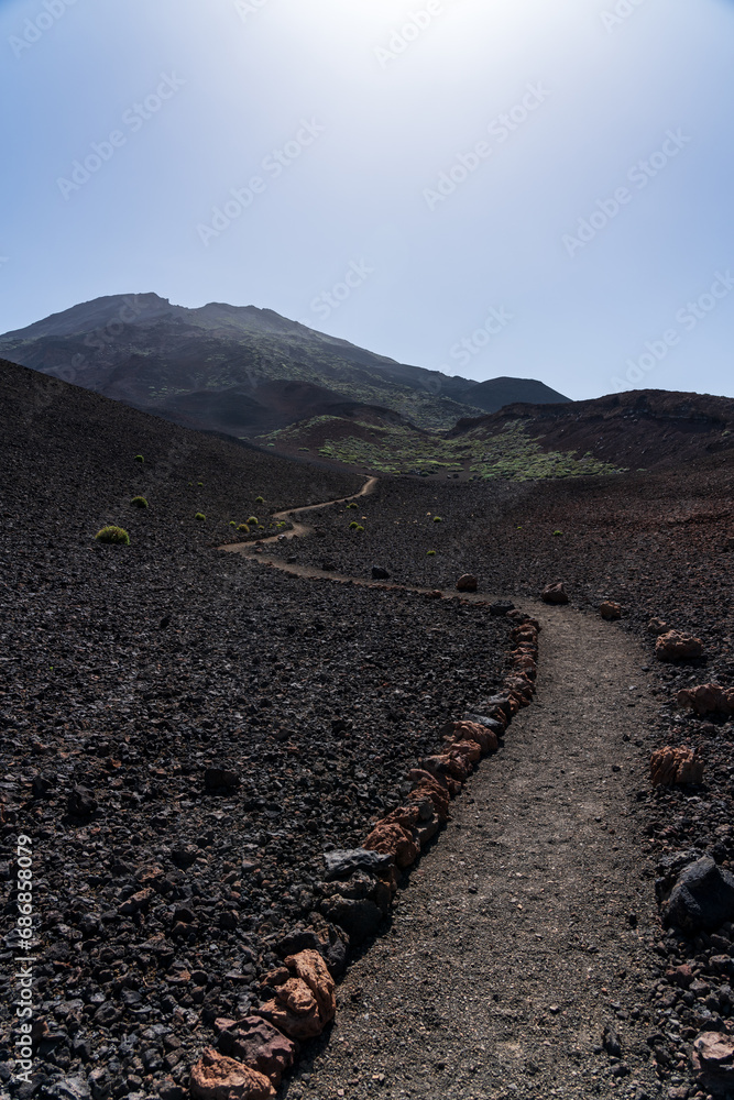 Trail to volcano Pico Viejo - the second highest peak of Tenerife. Typical volcanic landscape. Canary Islands. Spain.
