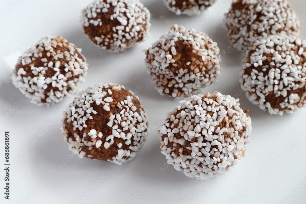 Swedish home made chocolate balls or oatmeal ball. Traditional tasty sweets. Close up and isolated.