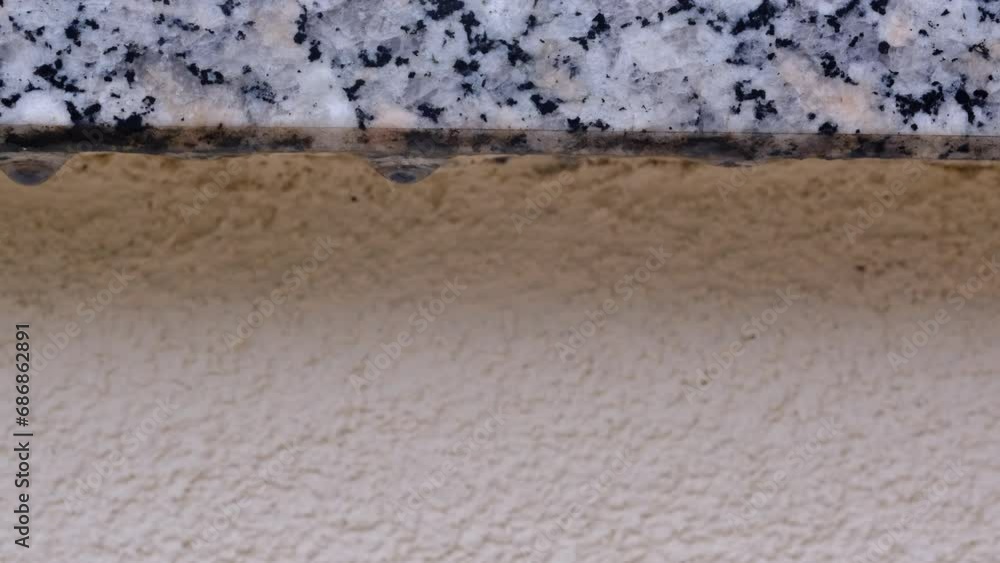 Raindrops fall from a marble slab Raindrops fall from a marble slab