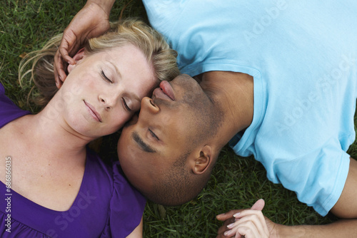 Couple Lying in Grass photo
