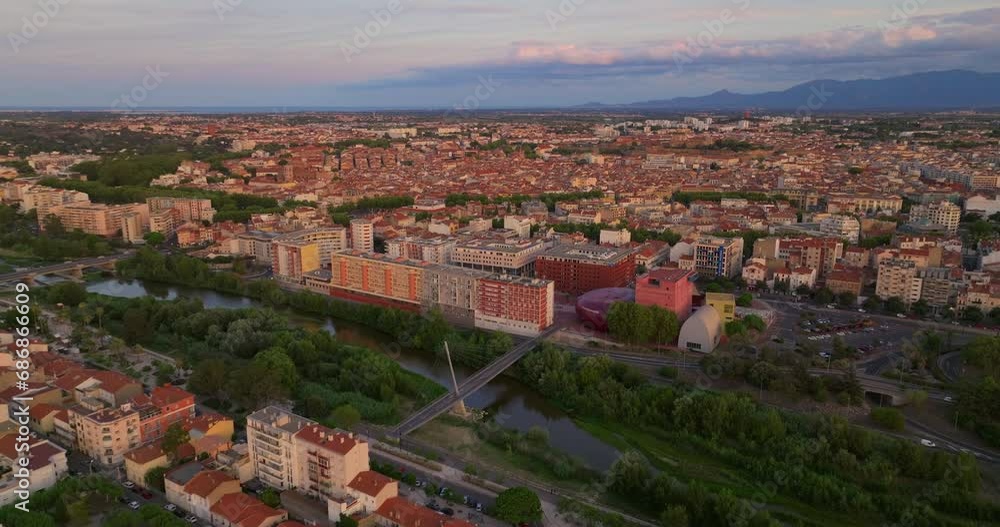 Aerial view of Perpignan, France. Residential buildings and Tet River visible from above. City centre Aerial view of Perpignan, France. Residential buildings and Tet River visible from above. City centre