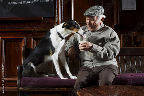 Man With Dog in Pub