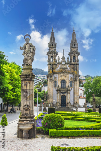 Sao Gualter Church (Igreja de Nossa Senhora da Consolacao e Dos Santos Passos) in the Old City of Guimaraes, Portugal. The church built in XVIII century with Baroque style and Rococo decoration. photo