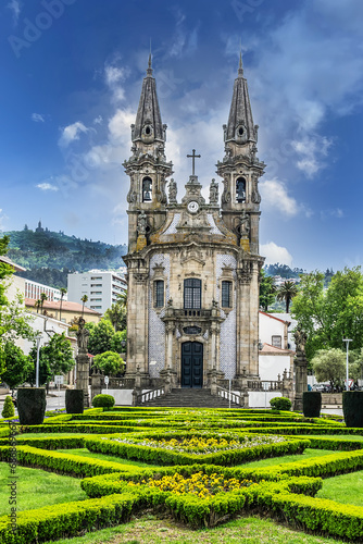 Sao Gualter Church (Igreja de Nossa Senhora da Consolacao e Dos Santos Passos) in the Old City of Guimaraes, Portugal. The church built in XVIII century with Baroque style and Rococo decoration. photo