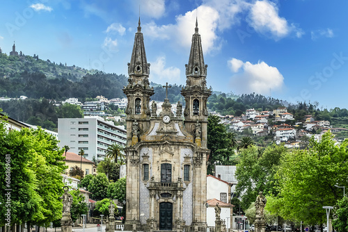 Sao Gualter Church (Igreja de Nossa Senhora da Consolacao e Dos Santos Passos) in the Old City of Guimaraes, Portugal. The church built in XVIII century with Baroque style and Rococo decoration. photo