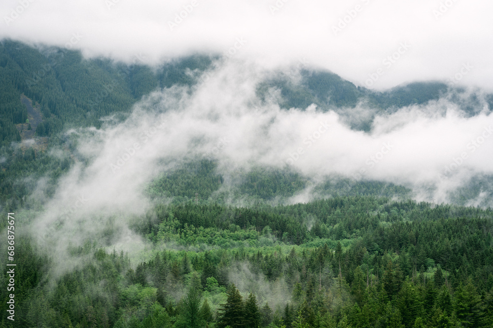 Misty mountain views from hiking trail along Snoqualmie Pass in Washington Misty mountain views from hiking trail along Snoqualmie Pass in Washington